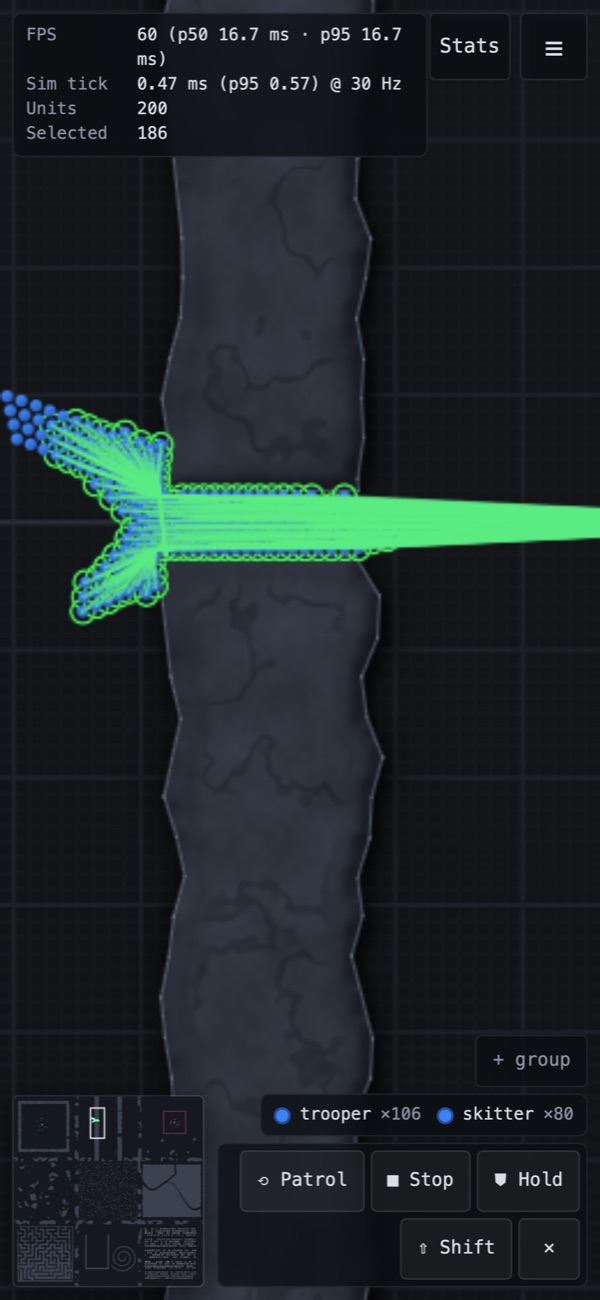 The demo on a phone screen: a group of selected units with order lines, a minimap, and a command bar with Patrol, Stop, Hold and Shift buttons.